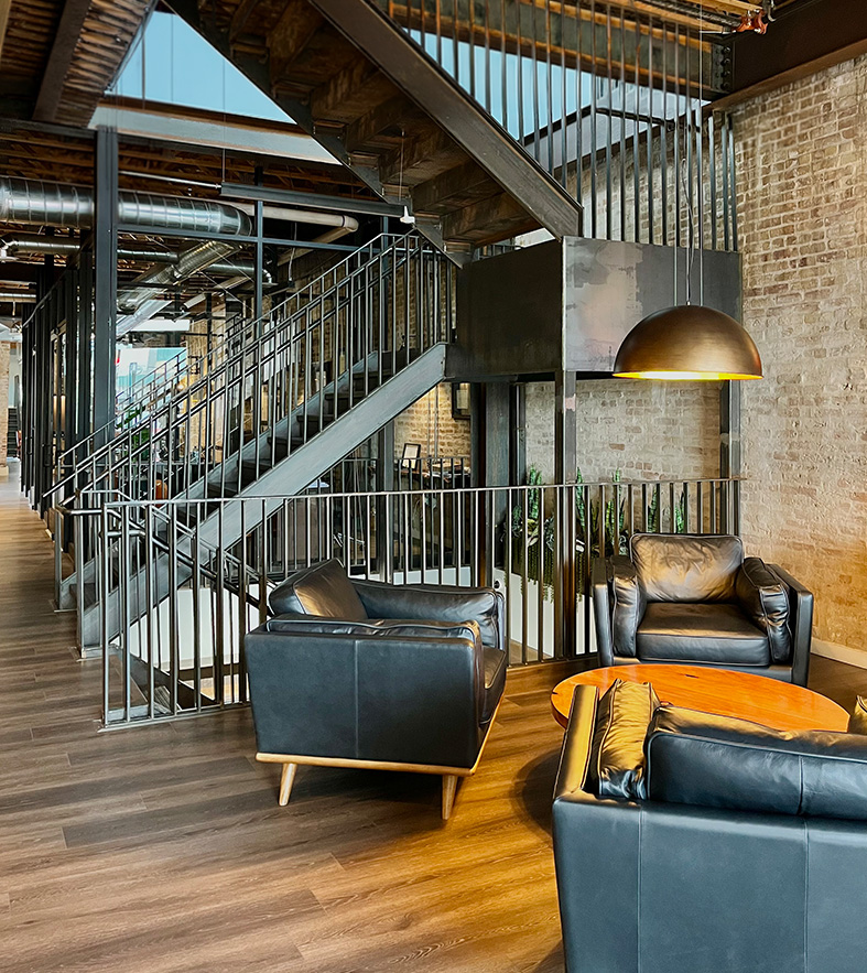Steel staircase and railing fabricated by Valex inside a commercial loft